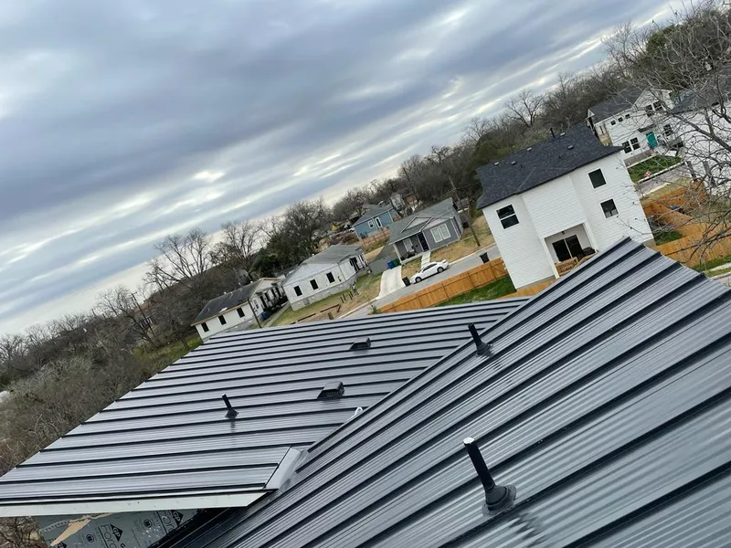 Standing seam metal roof panels with vents for Skylight Repair in Poteau